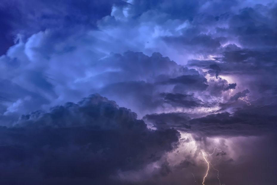 Lightning coming out of a large cumulonimbus cloud at night - Felix Mittermeier via Unsplash