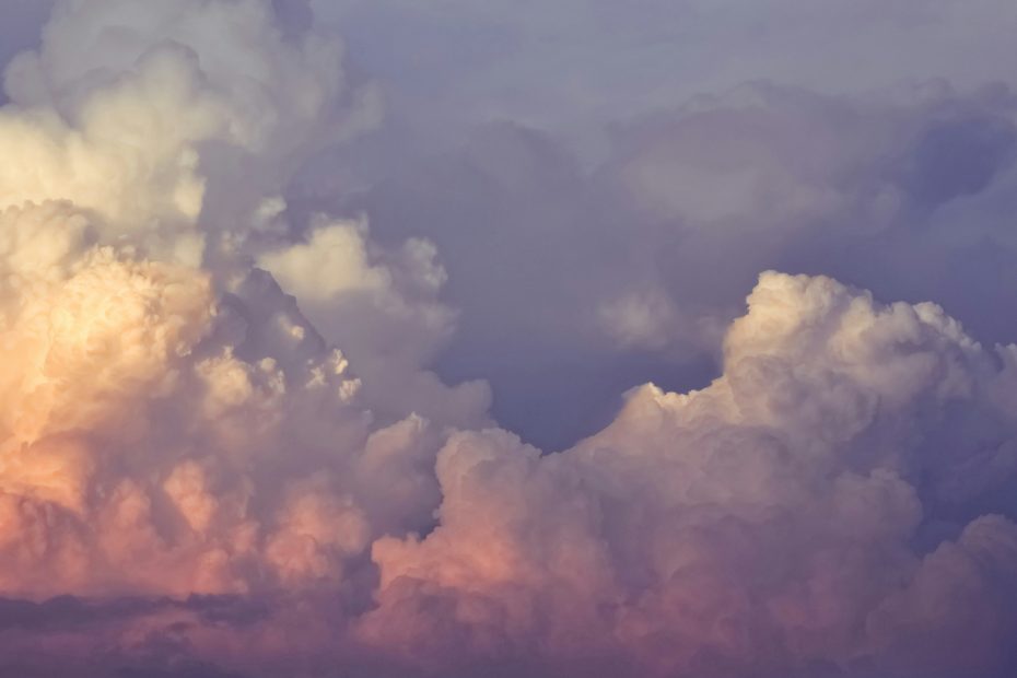 Colorful cumulus clouds at sunset - Lukasz Lada via Unsplash