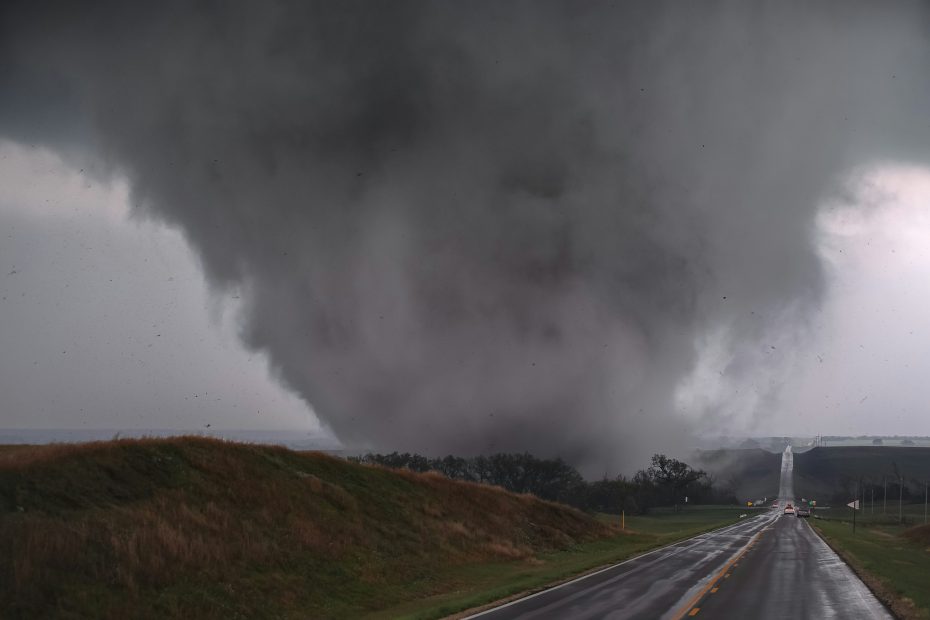 Wedge tornado moving across a road - Greg Johnson via Unsplash