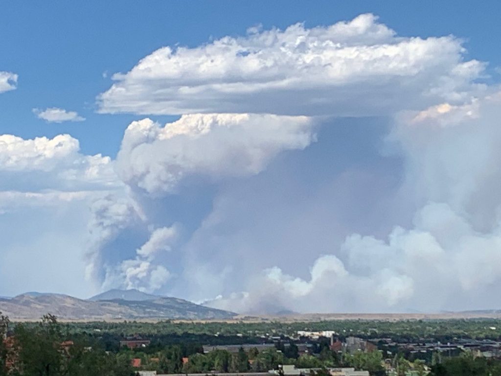 View of the Alexander Mountain Fire (left vertical plume with Pyrocumulus), and Stone Canyon Fire (smoke plume tilted to the right). Courtesy of NWS Boulder