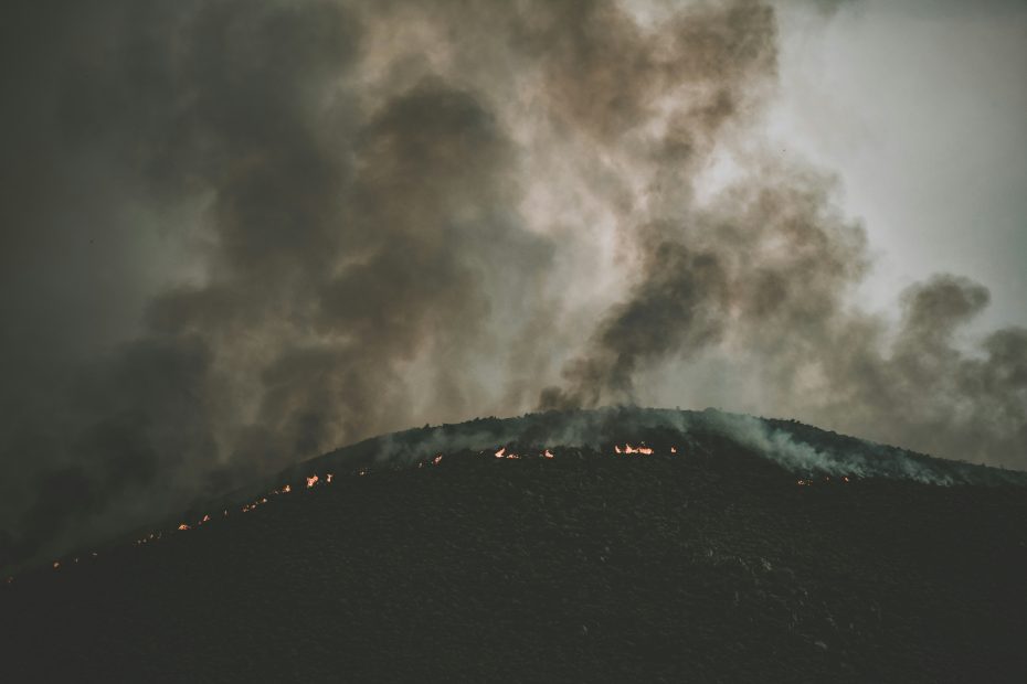 Fire on a hill - photo by Tim Mossholder via Unsplash